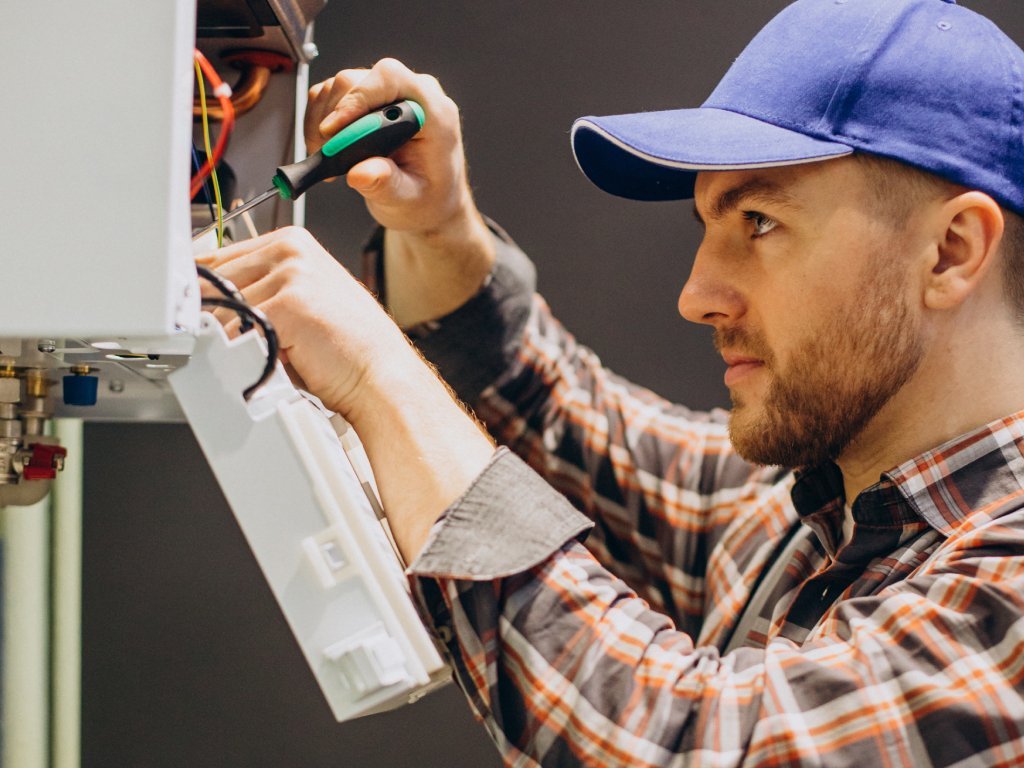 HVAC technicians working on air conditioning system